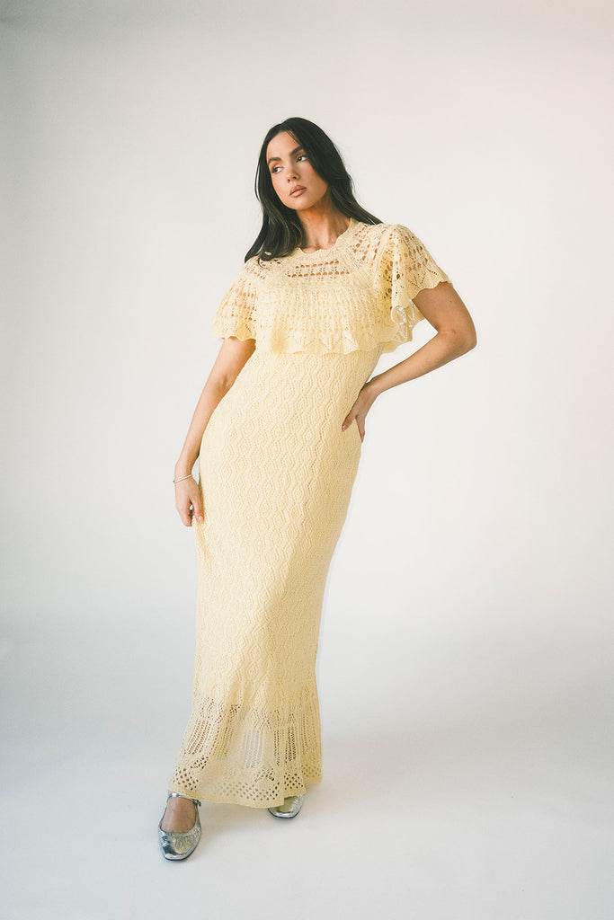 butter yellow crochet maxi dress with a chic cape overlay. the perfect spring + summer dress for weddings, bridal showers, + garden parties.