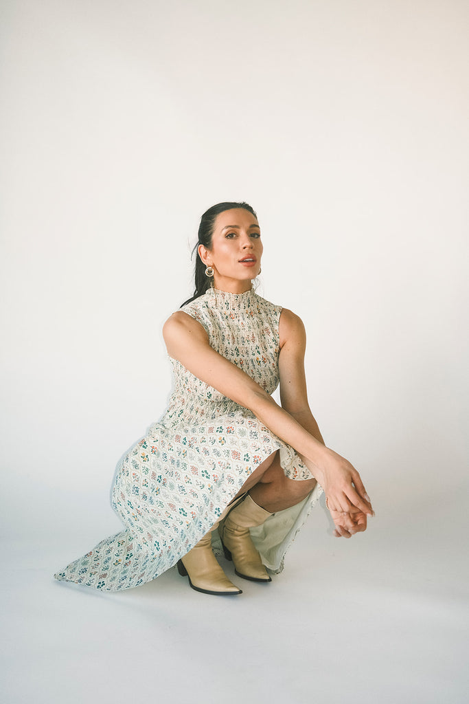 floral skirt set with a smocked mock neck tank + an a-line maxi skirt. the perfect elevated set for vacations, weddings, + fancy date nights.