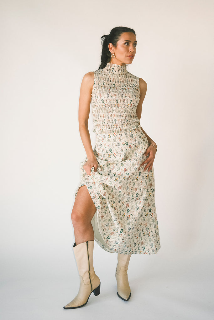 floral skirt set with a smocked mock neck tank + an a-line maxi skirt. the perfect elevated set for vacations, weddings, + fancy date nights.