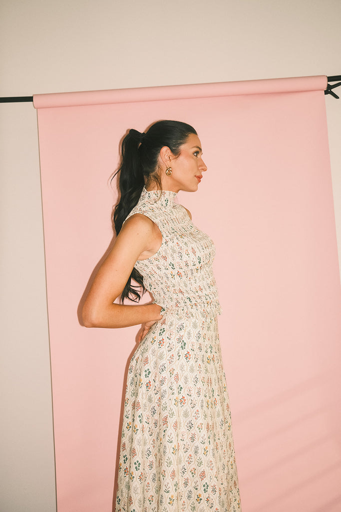 floral skirt set with a smocked mock neck tank + an a-line maxi skirt. the perfect elevated set for vacations, weddings, + fancy date nights.