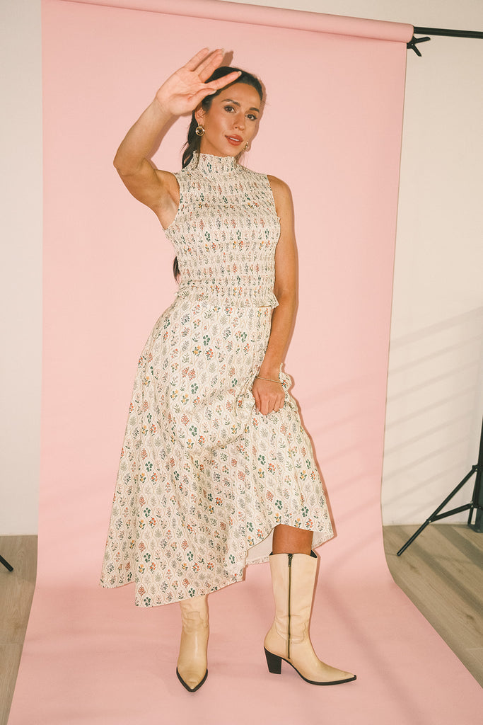 floral skirt set with a smocked mock neck tank + an a-line maxi skirt. the perfect elevated set for vacations, weddings, + fancy date nights.