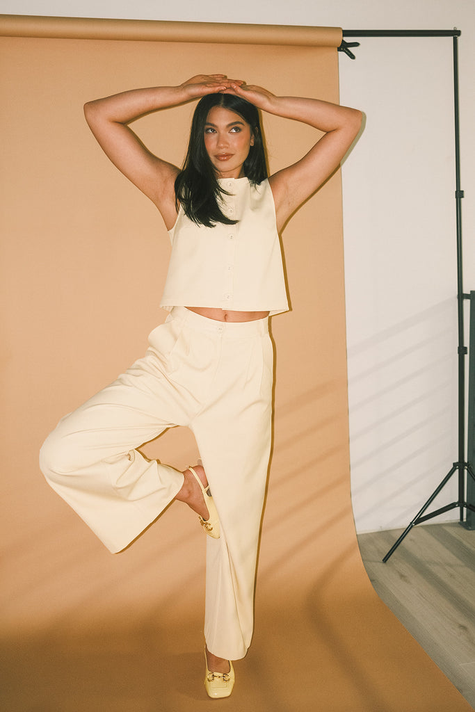 butter yellow pant set with a cropped button up tank + high waisted trousers. the perfect elevated set for the office + everyday wear.