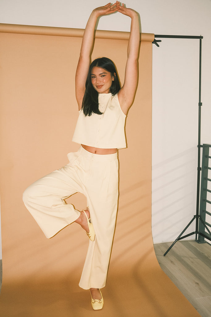 butter yellow pant set with a cropped button up tank + high waisted trousers. the perfect elevated set for the office + everyday wear.