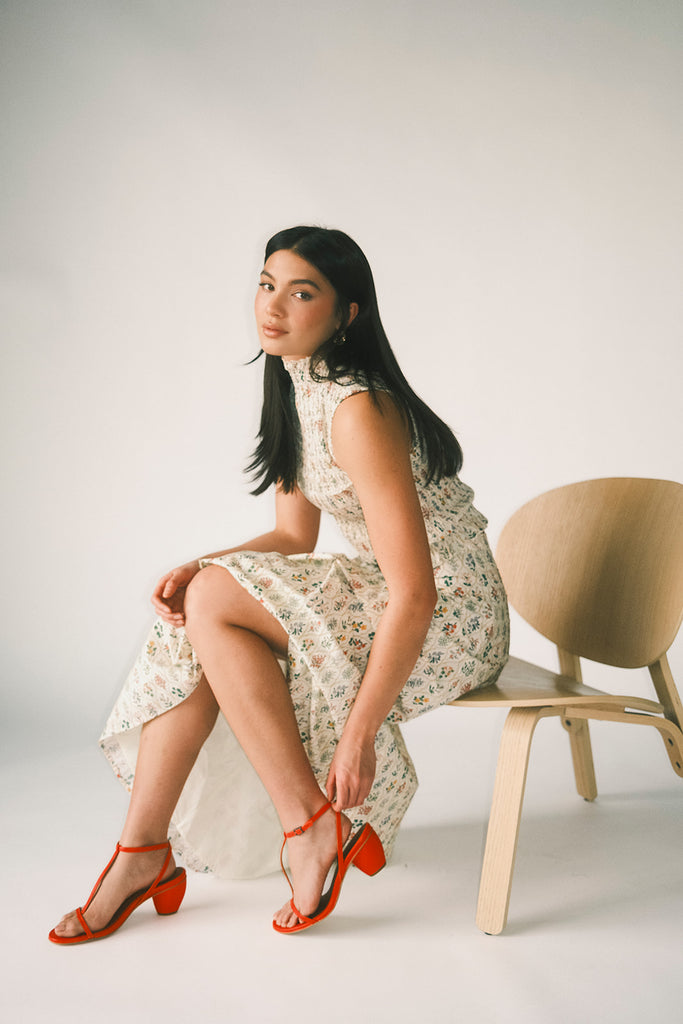 floral skirt set with a smocked mock neck tank + an a-line maxi skirt. the perfect elevated set for vacations, weddings, + fancy date nights.