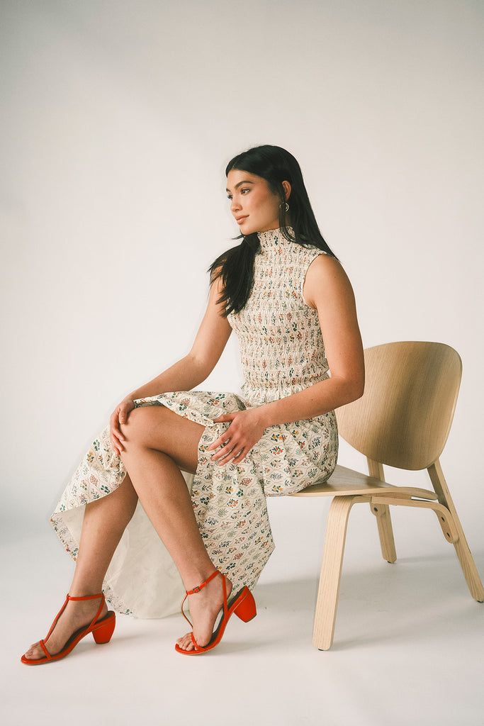 floral skirt set with a smocked mock neck tank + an a-line maxi skirt. the perfect elevated set for vacations, weddings, + fancy date nights.