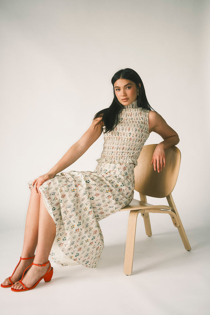 floral skirt set with a smocked mock neck tank + an a-line maxi skirt. the perfect elevated set for vacations, weddings, + fancy date nights.