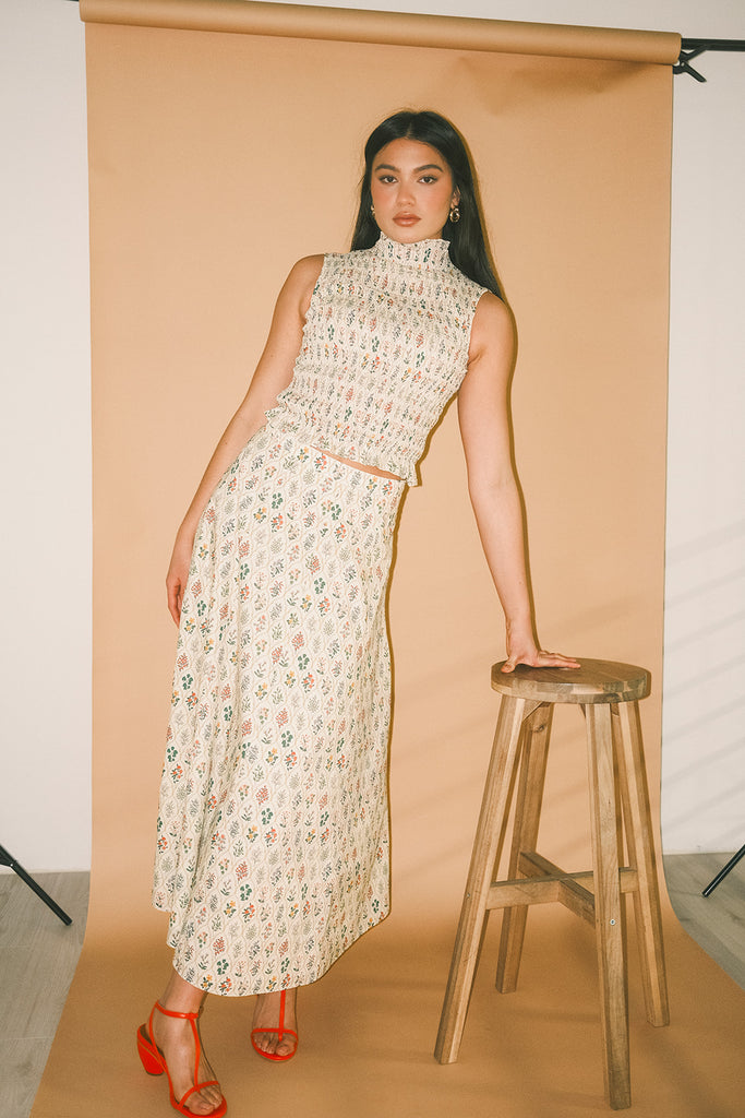 floral skirt set with a smocked mock neck tank + an a-line maxi skirt. the perfect elevated set for vacations, weddings, + fancy date nights.