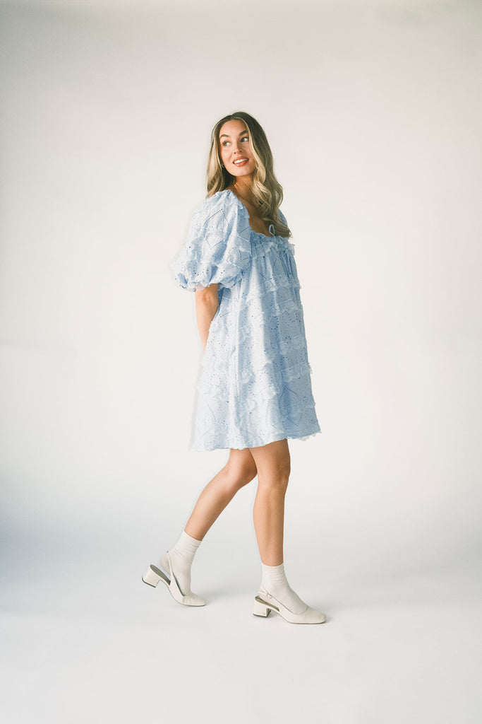 a blue puff sleeve mini dress with lace tiered details + a stretchy square neckline. perfect for family pictures, baby showers, weddings, + special occasions.
