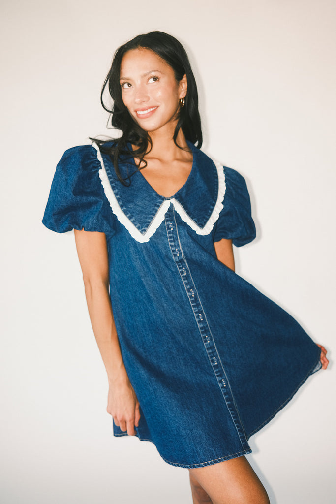 a puff sleeve denim dress with a lace trimmed collar detail. the perfect denim mini dress for date nights, family pictures, + everyday wear.
