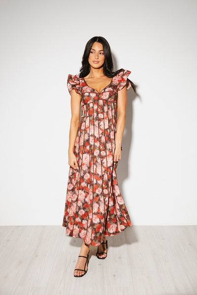 vintage-inspired floral dress with a sweetheart neckline + flutter sleeves. the perfect occasion dress for weddings, bridal showers, + formal events.

