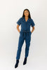 serious business woman jumpsuit // dark wash