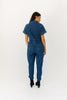 serious business woman jumpsuit // dark wash