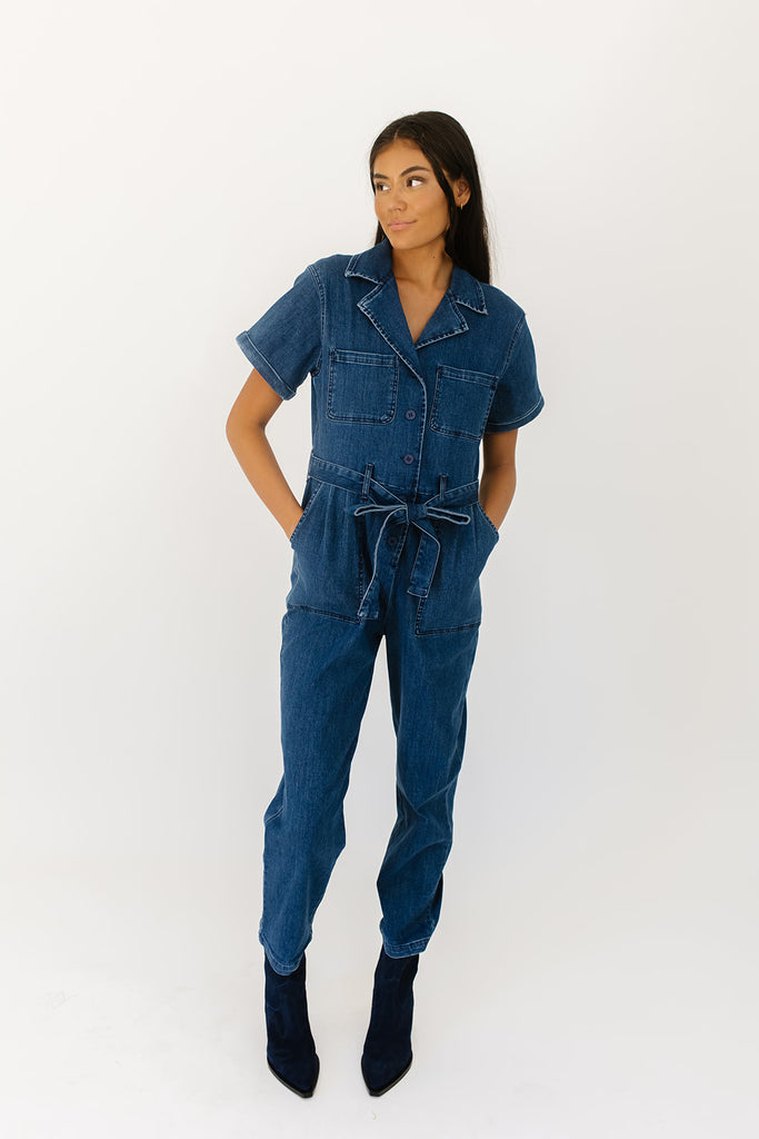 serious business woman jumpsuit // dark wash