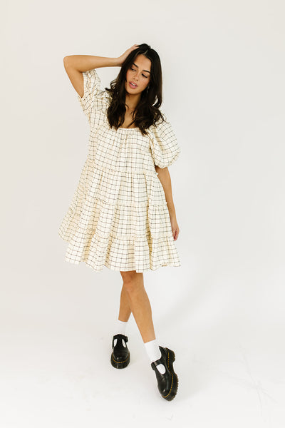 zoco daymaker dress: a short puff sleeve dress with a grid-style pattern + an elastic neckline. perfect for family pictures, weddings, and baby showers.
