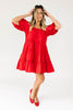 zoco daymaker dress: a short puff sleeve dress with an elastic neckline. the perfect red cotton dress for family pictures, weddings, and baby showers.

