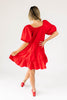 zoco daymaker dress: a short puff sleeve dress with an elastic neckline. the perfect red cotton dress for family pictures, weddings, and baby showers.
