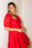 zoco daymaker dress: a short puff sleeve dress with an elastic neckline. the perfect red cotton dress for family pictures, weddings, and baby showers.
