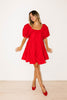 zoco daymaker dress: a short puff sleeve dress with an elastic neckline. the perfect red cotton dress for family pictures, weddings, and baby showers.

