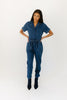 serious business woman jumpsuit // dark wash