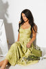a flowy v-waist green dress with a sleek scoop neckline + subtle floral print. the perfect vintage-inspired maxi dress for weddings, bridal showers, + garden parties.
