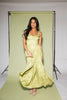 a flowy v-waist green dress with a sleek scoop neckline + subtle floral print. the perfect vintage-inspired maxi dress for weddings, bridal showers, + garden parties.
