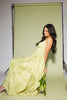 a flowy v-waist green dress with a sleek scoop neckline + subtle floral print. the perfect vintage-inspired maxi dress for weddings, bridal showers, + garden parties.

