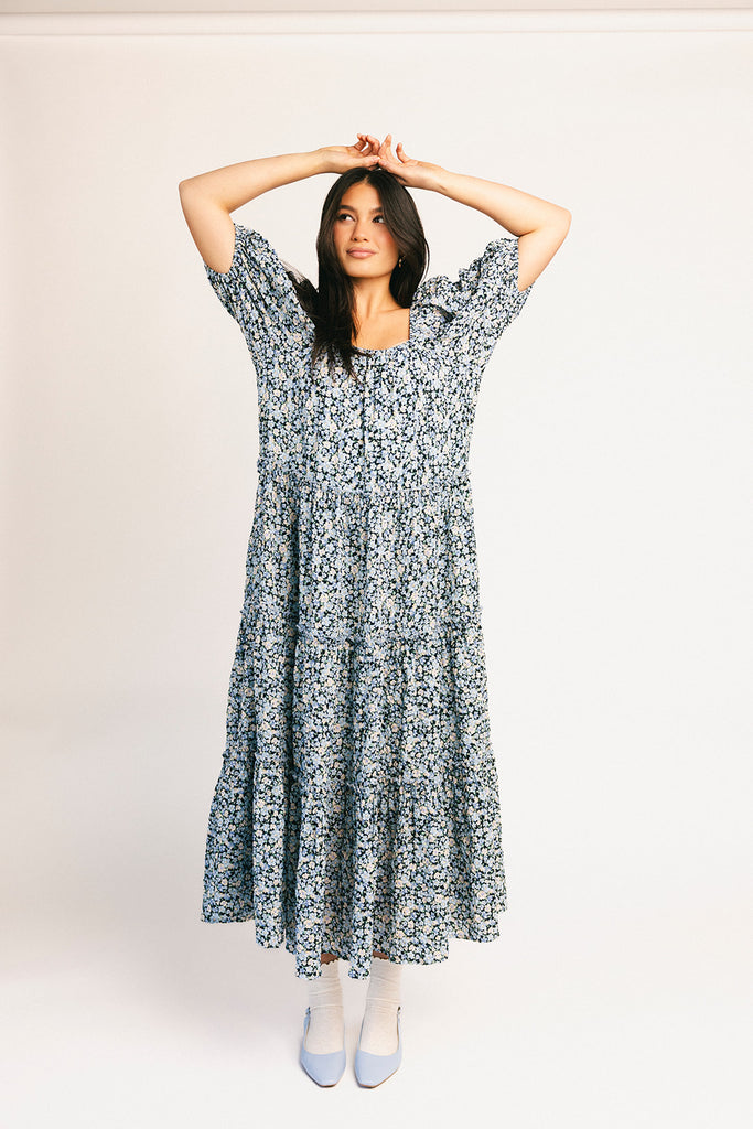 puff sleeve blue floral maxi dress with an elastic neckline. perfect for weddings, baby showers, and family pictures.