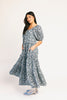 puff sleeve blue floral maxi dress with an elastic neckline. perfect for weddings, baby showers, and family pictures.