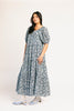puff sleeve blue floral maxi dress with an elastic neckline. perfect for weddings, baby showers, and family pictures.
