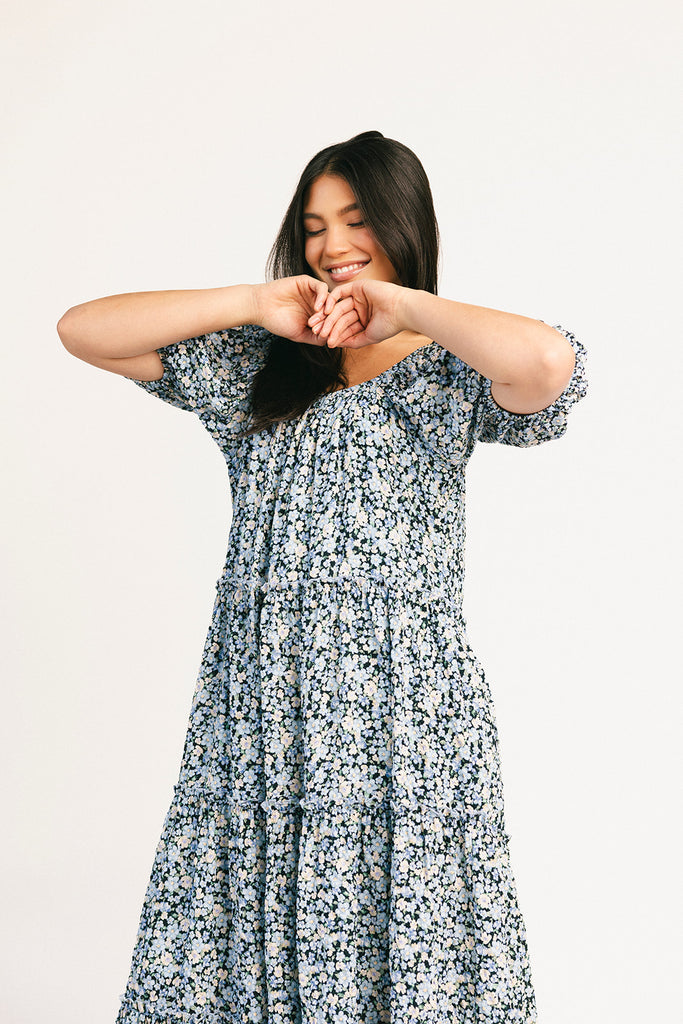 puff sleeve blue floral maxi dress with an elastic neckline. perfect for weddings, baby showers, and family pictures.