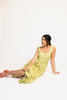 a flowy v-waist green dress with a sleek scoop neckline + subtle floral print. the perfect vintage-inspired maxi dress for weddings, bridal showers, + garden parties.
