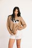 crewneck cow sweater with a relaxed fit. the perfect neutral cow detail sweater for spring outfits and lightweight layering. 
