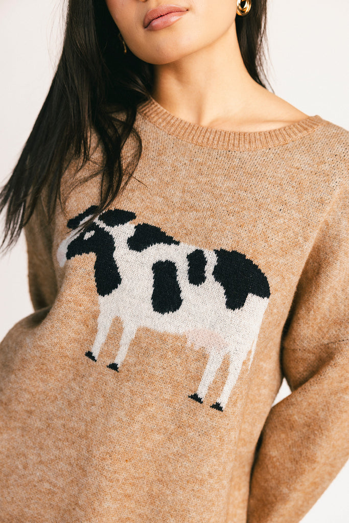 crewneck cow sweater with a relaxed fit. the perfect neutral cow detail sweater for spring outfits and lightweight layering. 
