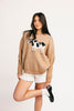 crewneck cow sweater with a relaxed fit. the perfect neutral cow detail sweater for spring outfits and lightweight layering. 

