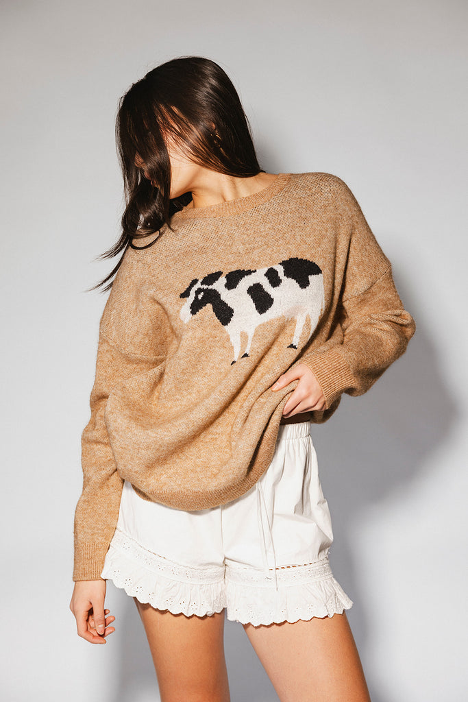 crewneck cow sweater with a relaxed fit. the perfect neutral cow detail sweater for spring outfits and lightweight layering. 

