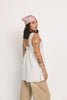 a white tank with a babydoll style silhouette + eyelet details. pair it with the matching white shorts to create the perfect two piece set for brunch dates, vacations, + everyday wear. 