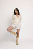 white cotton shorts with eyelet details. pair them with the matching white tank top to create the perfect two piece set for brunch dates, vacations, + everyday wear. 