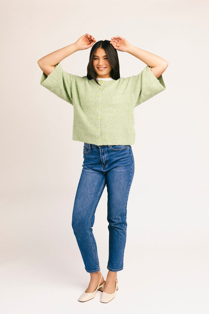 light green short sleeve cardigan with a slouchy, relaxed fit. perfect for casual outfits + lightweight layering.
