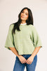 light green short sleeve cardigan with a slouchy, relaxed fit. perfect for casual outfits + lightweight layering.
