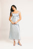 a light blue silk midi dress with lace detailing + a fitted silhouette. the perfect short sleeve occasion dress for weddings, bridal showers, + dinner parties.
