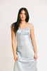 a light blue silk midi dress with lace detailing + a fitted silhouette. the perfect short sleeve occasion dress for weddings, bridal showers, + dinner parties.
