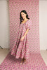 zoco daymaker dress: puff sleeve pink floral maxi dress with an elastic neckline. perfect for weddings, baby showers, + family pictures.