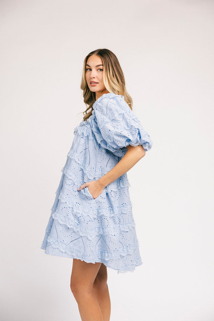 a blue puff sleeve mini dress with lace tiered details + a stretchy square neckline. perfect for family pictures, baby showers, weddings, + special occasions. 
