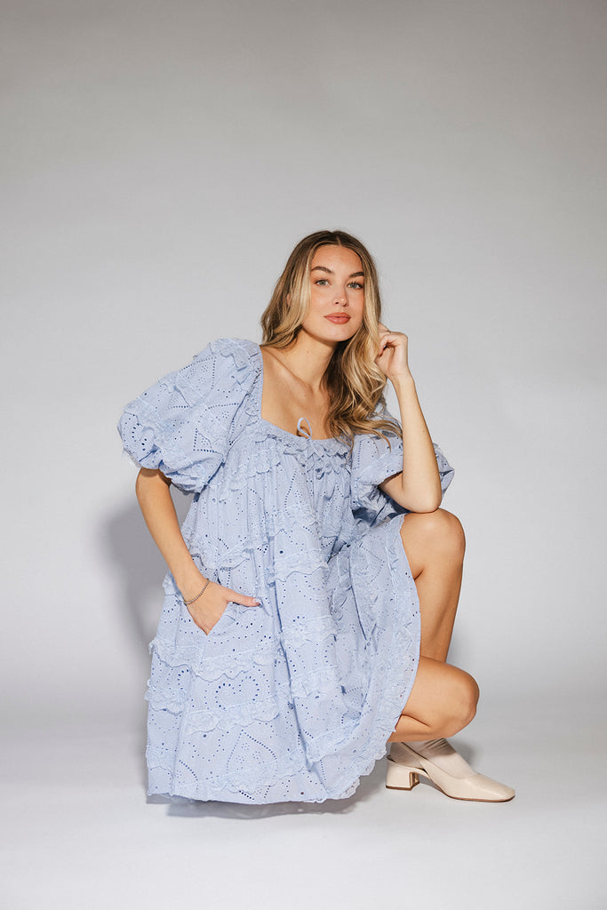 a blue puff sleeve mini dress with lace tiered details + a stretchy square neckline. perfect for family pictures, baby showers, weddings, + special occasions. 

