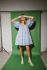 a blue puff sleeve mini dress with lace tiered details + a stretchy square neckline. perfect for family pictures, baby showers, weddings, + special occasions. 
