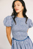a puff sleeve blue gingham dress with a smocked bodice + side tie details. the perfect vintage-inspired dress for family pictures, weddings, + special occasions. 
