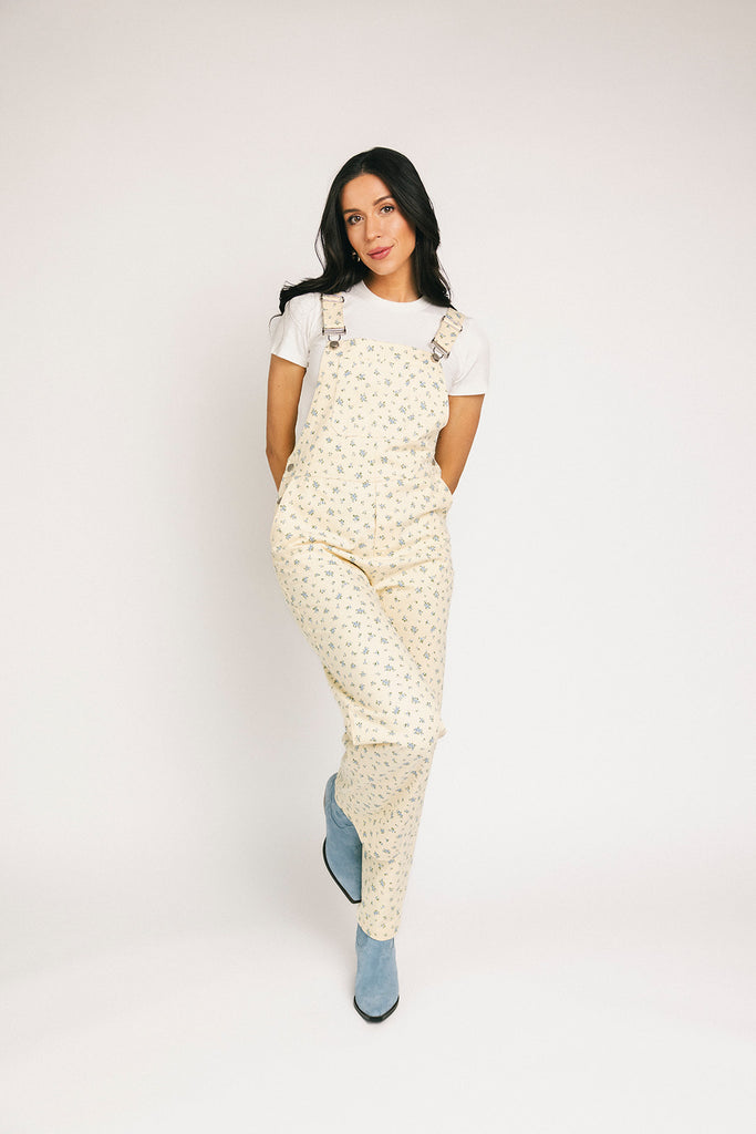 denim overalls with a ditsy blue floral pattern + straight leg fit. the perfect floral overalls for everyday wear + casual outfit styling.
