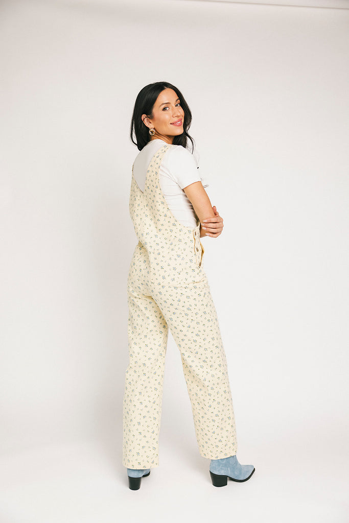 denim overalls with a ditsy blue floral pattern + straight leg fit. the perfect floral overalls for everyday wear + casual outfit styling.
