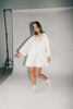 a white satin mini dress with a vintage-inspired silhouette + long balloon sleeves. the perfect little white dress for graduations, bridal showers, + fancy dinner dates.
