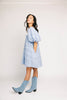 a blue puff sleeve mini dress with lace tiered details + a stretchy square neckline. perfect for family pictures, baby showers, weddings, + special occasions. 
